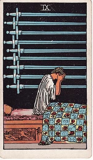 Devítka mečů — tarot karta